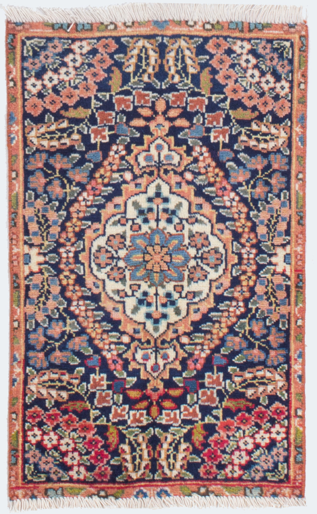 floral Persian vintage bathmat with lots of roses and light colors of orange, pink and blue on the background